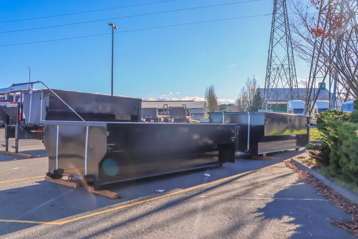 Roll-off dumpster ready for waste disposal at job site for 10 Yard Dumpster Rental in Lakewood